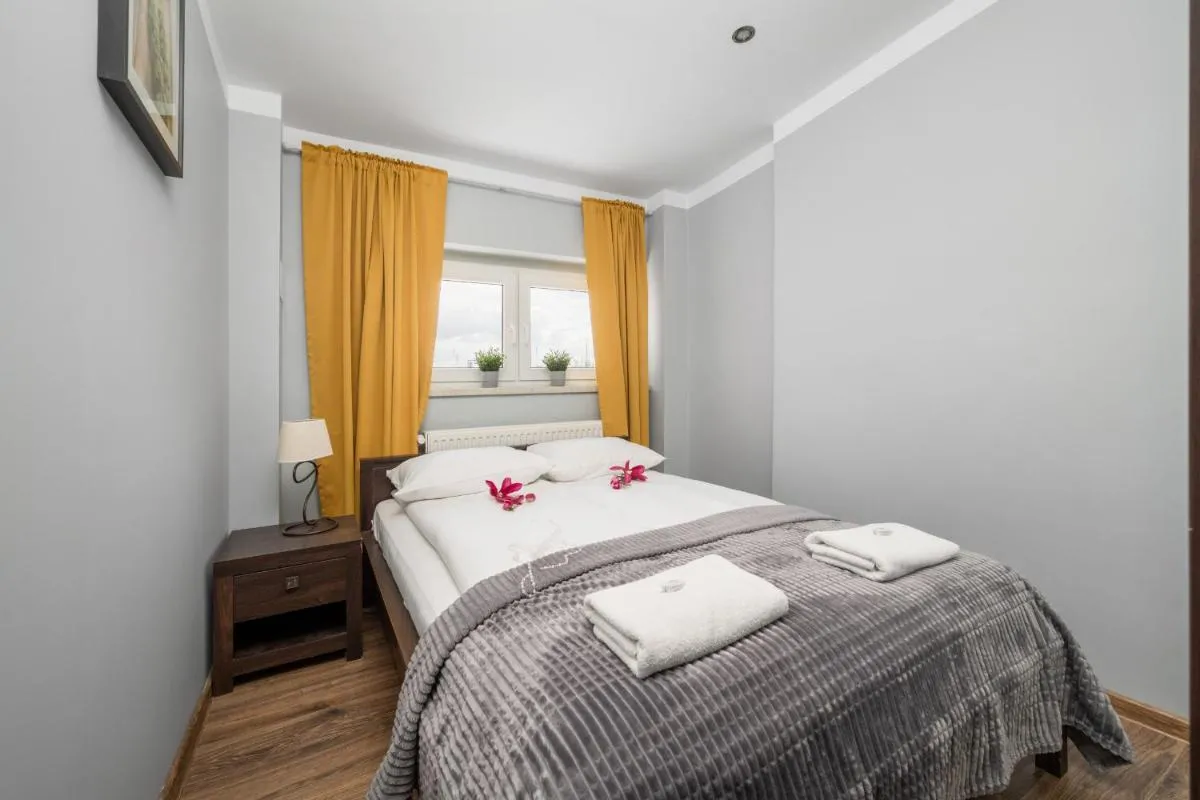 Image 1 of Market Square Corner Apartment Kuźnicza by Noclegi Renters