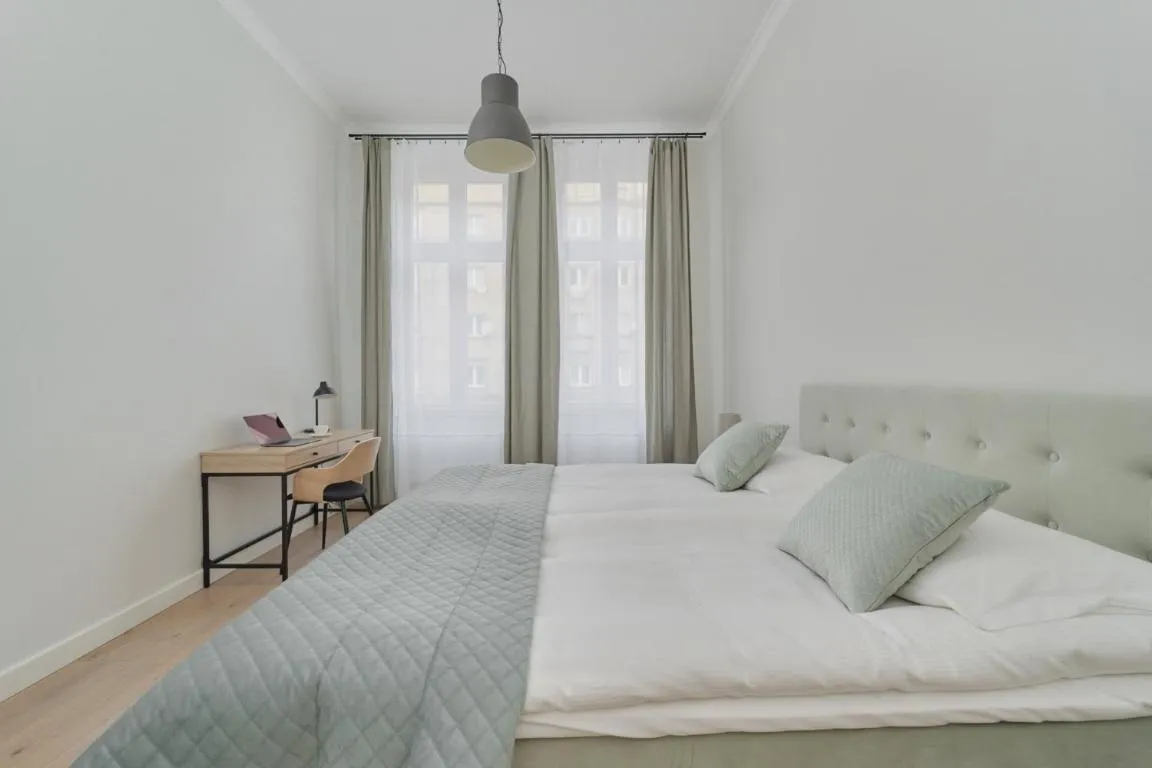 Image of Piłsudskiego Stylish Apartment by Noclegi Renters